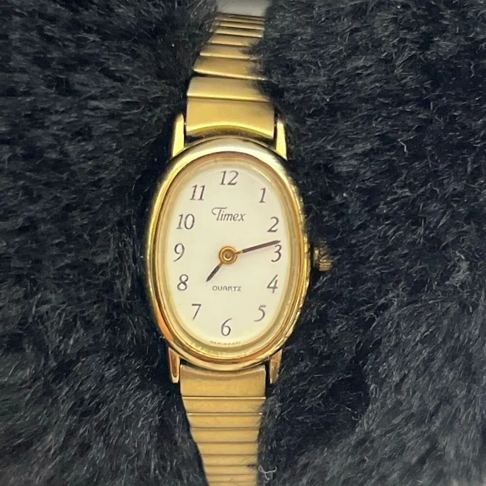 Timex Women's Gold-Tone Cavatina Oval Case 377 BA Cell Expansion Band Wristwatch
